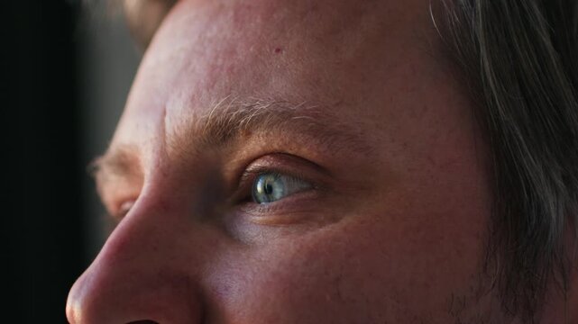 Smiling middle aged man 40 years old standing in office, portrait. Smiling blue eyes office worker, freelancer.