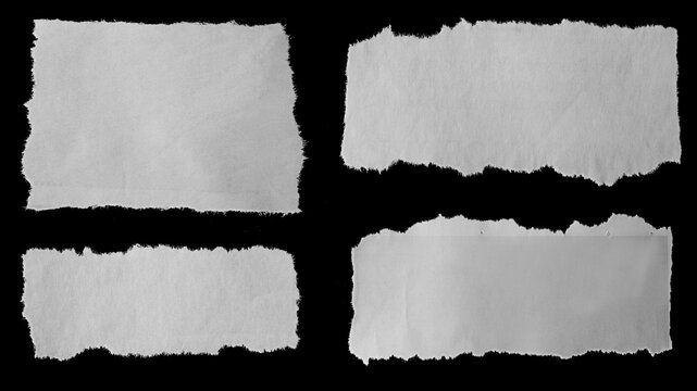 Torn papers on black
