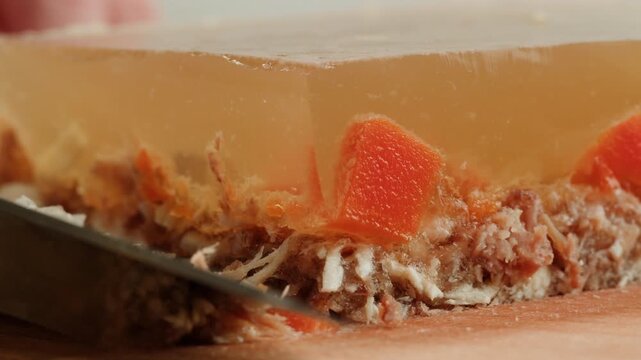 Meat aspic, slavic food, Traditional Russian pork meat aspic Kholodets with horseradish, mustard, jellied jelly beef, eating in restaurant chicken tasty dish. Close up on kitchen. 