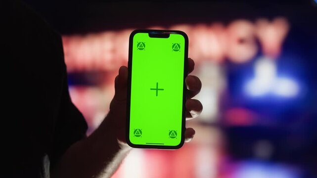Emergency medical service team on a road, incident, medic using walkie-talkie, transports a patient to the hospital in a rescue vehicle or ambulance. Using phone medical assistance on the