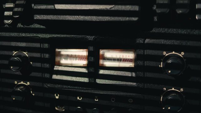 Tape audio music player, VHS studio magnetic tape, vintage retro spool reel to reel player and recorder, magnetic tape data storage close up, music studio. 