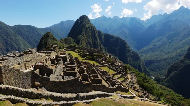 Panoramic view of Machu Picchu on a beautiful sunny day, The Valley of the Incas, Cuzco, Peru. Famous and tourist place in South America