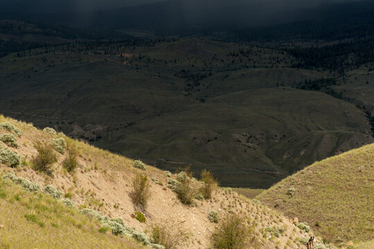 Canada, BC, Lytton.  Dramatic light light on the hills in BC's arid Cariboo region