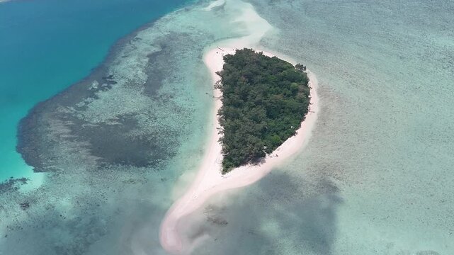 Aerial shot of Kerayaan Beccu Beach, a white-sand beach in Kotabaru, South Kalimantan
