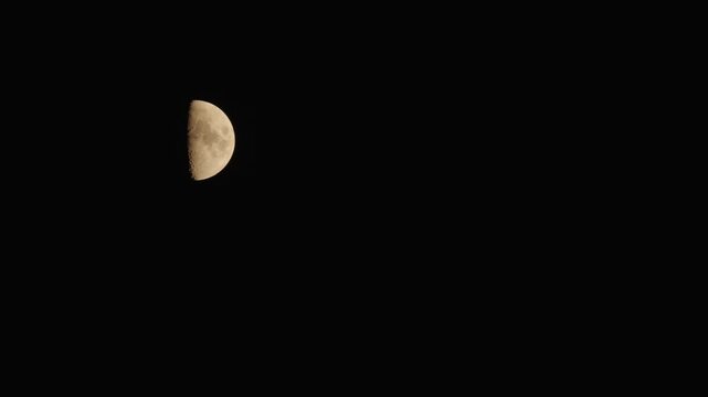 Tokyo,Japan - June 22, 2026: Half moon observed soon after the sunset