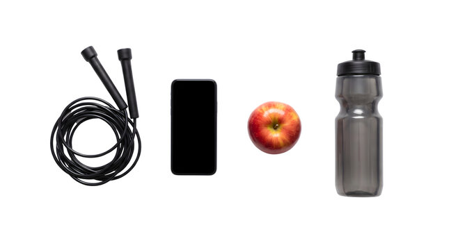 Overhead view of essential fitness equipment jump rope, smartphone, fresh apple, and water bottle arranged neatly on a clean white background for a healthy lifestyle concept.