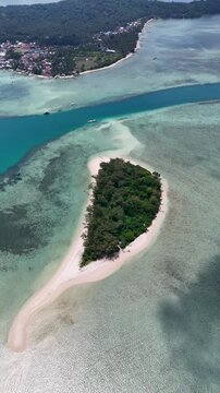 Aerial shot of Kerayaan Beccu Beach, a white-sand beach in Kotabaru, South Kalimantan