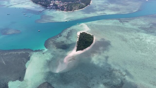 Aerial shot of Kerayaan Beccu Beach, a white-sand beach in Kotabaru, South Kalimantan