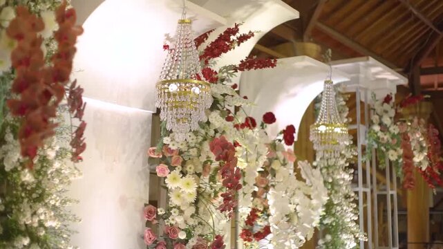 Romantic Indoor Venue with Elegant Floral Decorations for Wedding Ceremony