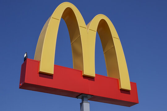 McDonald's Restaurant. McDonald's is offering employees higher hourly wages, paid time off, and tuition payments.
