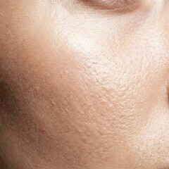 Fototapeta premium Macro photograph of human cheek skin texture with visible pores