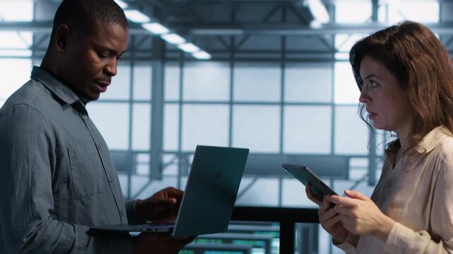 System administrators use device in a server hub to perform vulnerability scans and verify firewall security, combining vulnerability scanning, security patch and firewall security.