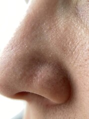 Fototapeta premium Macro photograph of human nose pores and skin texture