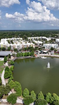 Apartments and homes surrounding Center Lake Park at downtown Oviedo in Seminole County, Florida.