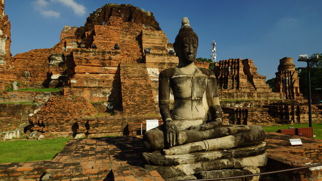Scenic archaeological site with a sacred Buddhist monument and old brick towers