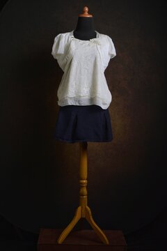 Off-white lace mixes chiffon blouse with short sleeves bolero and a black mini skirt 