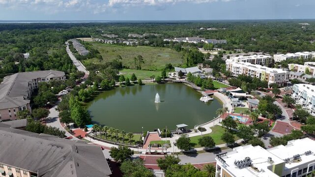 Apartments and homes surrounding Center Lake Park at downtown Oviedo in Seminole County, Florida.
