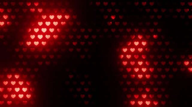 Loop Video Animation of Red Glowing Hearts Symbol of Love and Valentine's Day Pattern on Black Background.
