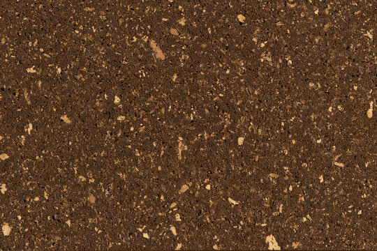 Dark brown granular cork texture background