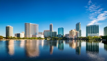 Obraz premium a stunning view of the tampa florida skyline with modern skyscrapers reflecting in the water below tampa florida