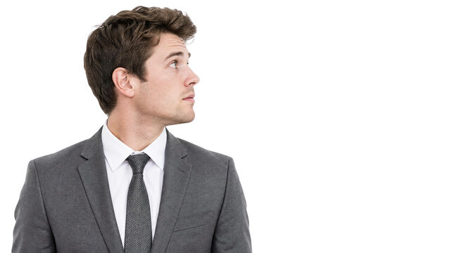 Professional Young Businessman in Gray Suit Looking Sideways to Copy Space Isolated