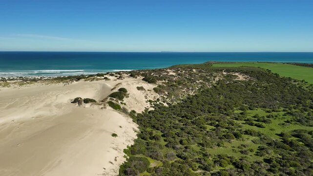 White Hut, Yorke Peninsula, South Australia &ndash; 4K aerial drone view of coastal dunes, native bushland and Daly Head Road Beach