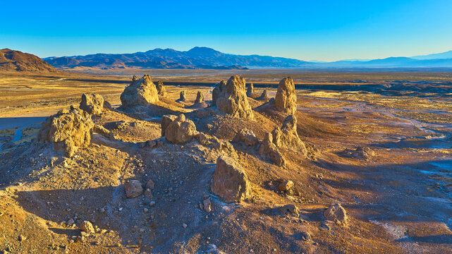 Aerial Trona Pinnacles Rock Formations in California Desert at Golden Hour