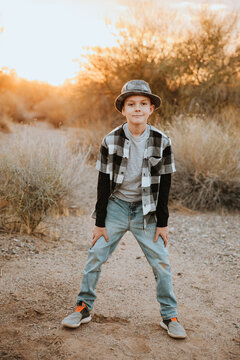 Fall Portrait of a Happy Boy Wearing Hat