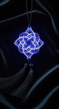 Close-up of a mystical amulet featuring an intricate glowing knot centerpiece and soft silk tassels resting on a dark velvet surface, ornament, tradition, mystery