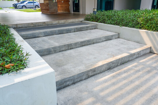 Stairs in the city,Granite stairs near subway,Stone stairway Modern,concrete stairs and metal railings outside,Empty modern building stairway composition..