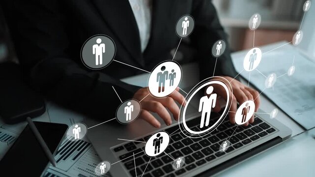 Business professional using laptop with graphic interface showcasing people connections in modern digital networking concept for teamwork and collaboration Gluon.