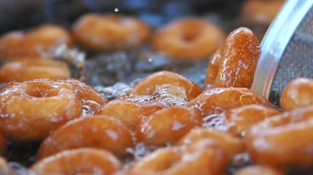 Frying turkish donuts in a kitchen at home