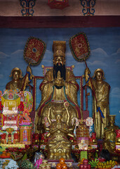 Fototapeta premium Statue of Tian Gong (Jade Emperor) at a traditional Chinese Taoist temple altar