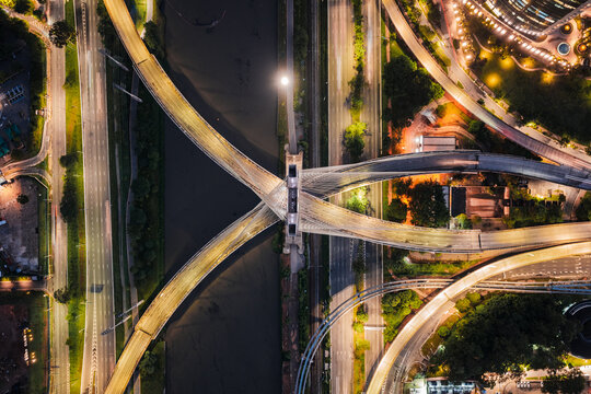 Highway interchange with light trails at night seen from above, Sao Paulo, Brazil
