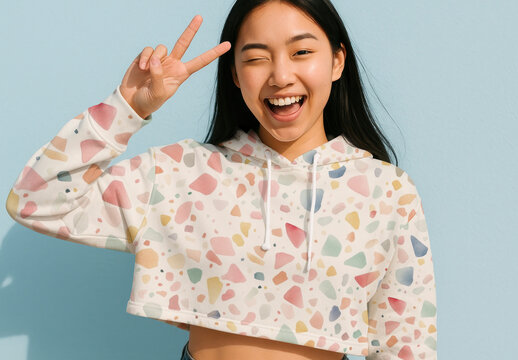 Joyful Woman In Patterned Hoodie Mockup PSD