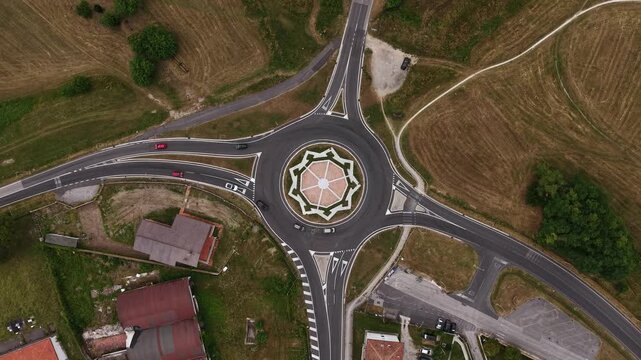 Roundabout Traffic, Top Down Drone View, Roads and Circle With Star, High Angle Aerial