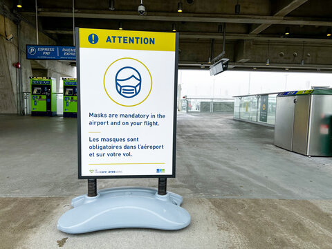 View of sign Face Covering are mandatory at Vancouver International Airport