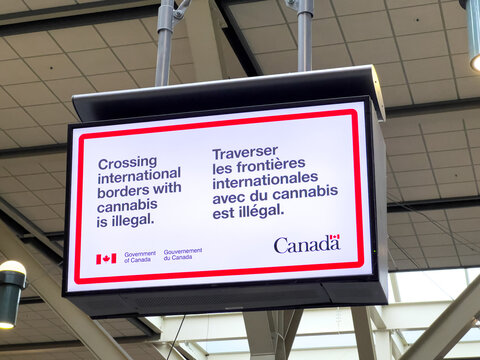 View of sign Crossing international borders with cannabis is illegal at Vancouver International Airport(YVR)