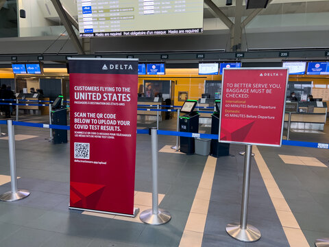 View of sign by Delta Airlines that requires all passengers to upload Covid Test Results before flight at Vancouver International Airport(YVR)