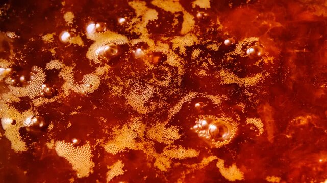 apricot jam boiling on the stove