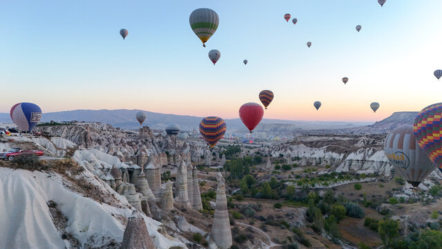 Hot Air Balloons Drifting Over Pashabag Valley at Sunrise, Cappadocia, Turkey
