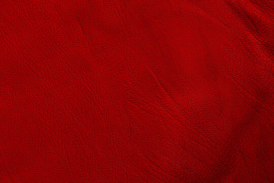 Dark red leather texture background with seamless pattern and high resolution.