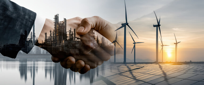 Firm handshake business deal renewable energy industrial plant wind turbine solar panel sunset double exposure partnership agreement collaboration