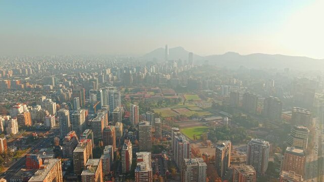 Panoramic aerial view of Santiago, Chile, with a light mist, and the Bernardo O'Higgins Military Academy