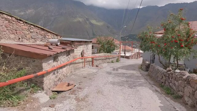 Georgian village with narrow roads and streets between stone houses. 