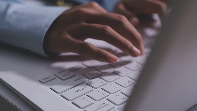Typing on laptop closeup, chatting in Facebook, meeting website. Blogger, journalist writing new article.