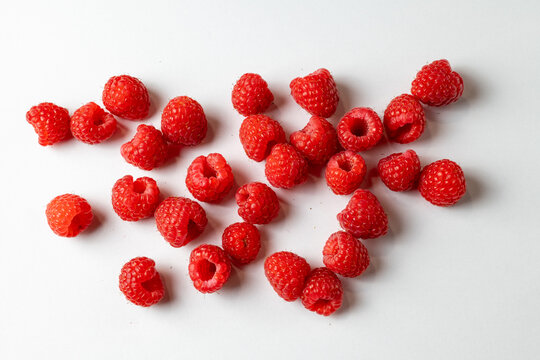 Fresh Red Raspberries on White Background