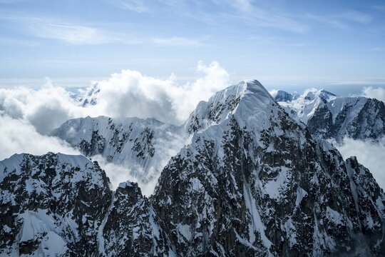 Summit of high mountains with glaciers, extreme ridge of Mount Huntington, 3731 m, aerial view, Alaska Range, Denali National Park, Alaska, USA