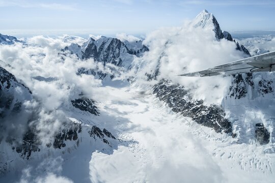 Summit of high mountains with glaciers, Mount Huntington on the right, 3731 m, aerial view, Alaska Range, Denali National Park, Alaska, USA