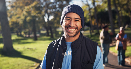 Fototapeta premium Volunteer, laugh and portrait of man in park for climate change, environmental care and charity. Happy, outdoor and person with support for sustainability, community service and eco friendly ngo